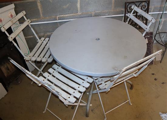 A garden patio table and four folding chairs, table width 91cm, depth 91cm, height 68cm